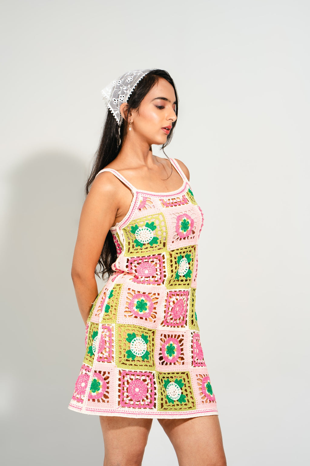 Suzy Bloom Crochet Mini Dress in pastel pink and green floral granny-square pattern – handmade summer vacation dress by Boarding Pass Store