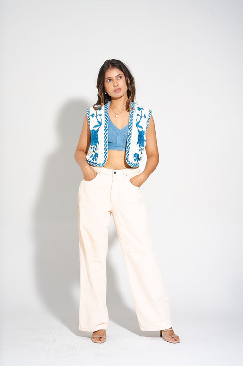 Side and texture detail of the handcrafted Amara Sapphire embroidered waistcoat