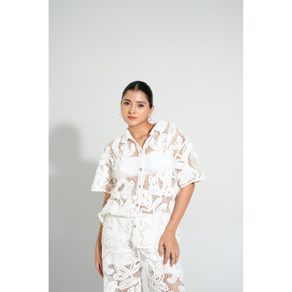 Close-up of the Laurel Crochet Set’s shirt detailing, featuring white floral lace crochet and a relaxed fit for chic summer outfits
