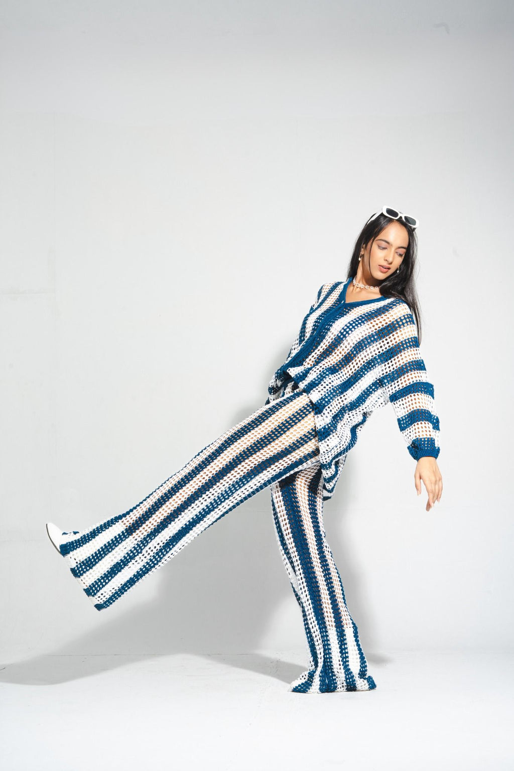 Women’s summer crochet co-ord set in blue and white stripes, ideal for beach trips, holidays, tropical travel and resort styling