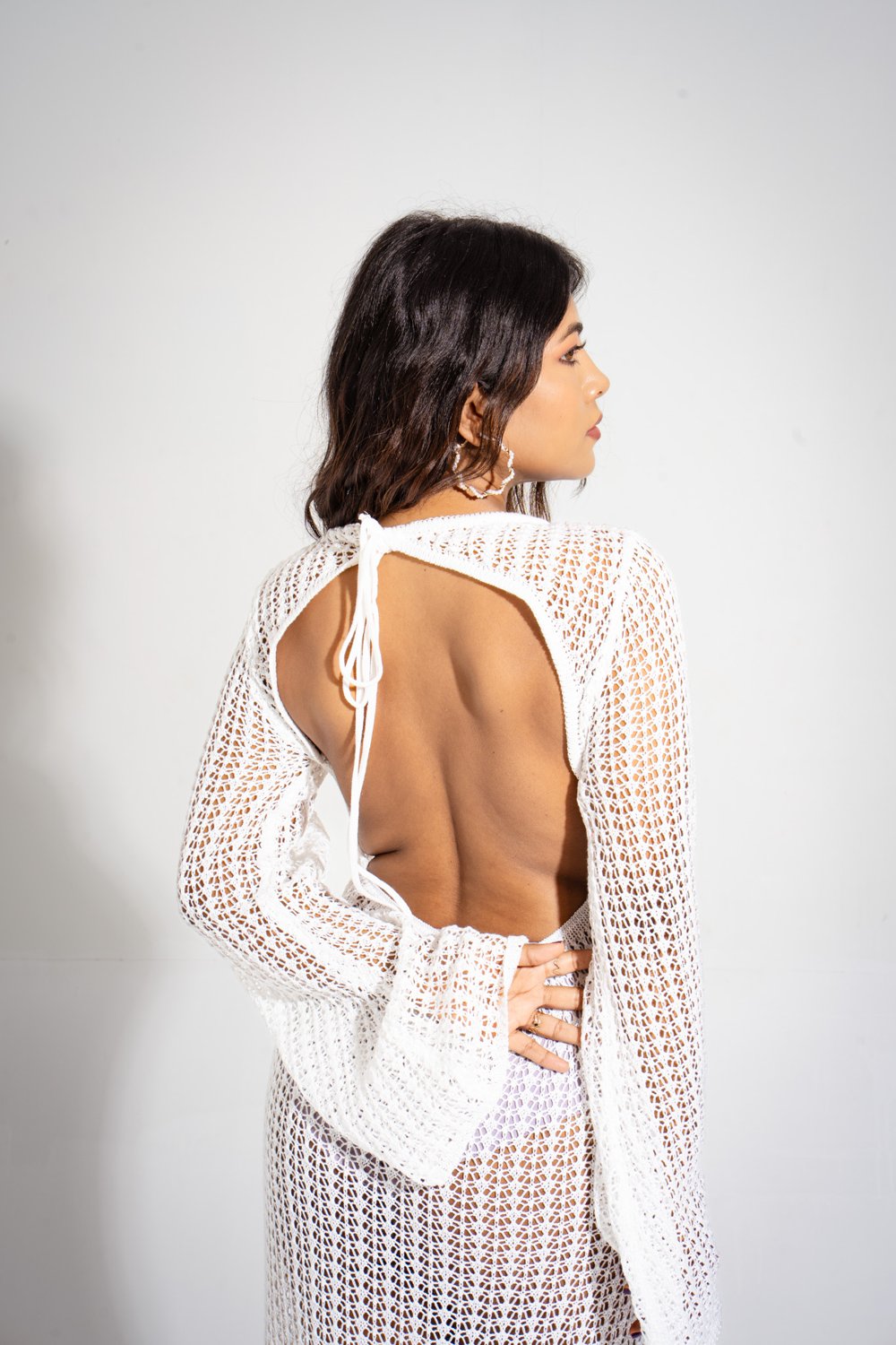 White Rosabella crochet long beach dress with open-back tie detail — breathable handmade resort outfit from BoardingPass.store
