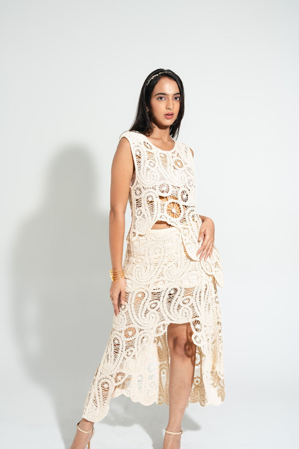 Full outfit view of Willow Crochet Coord Set featuring asymmetrical crochet skirt and sleeveless top — luxury holiday outfit.