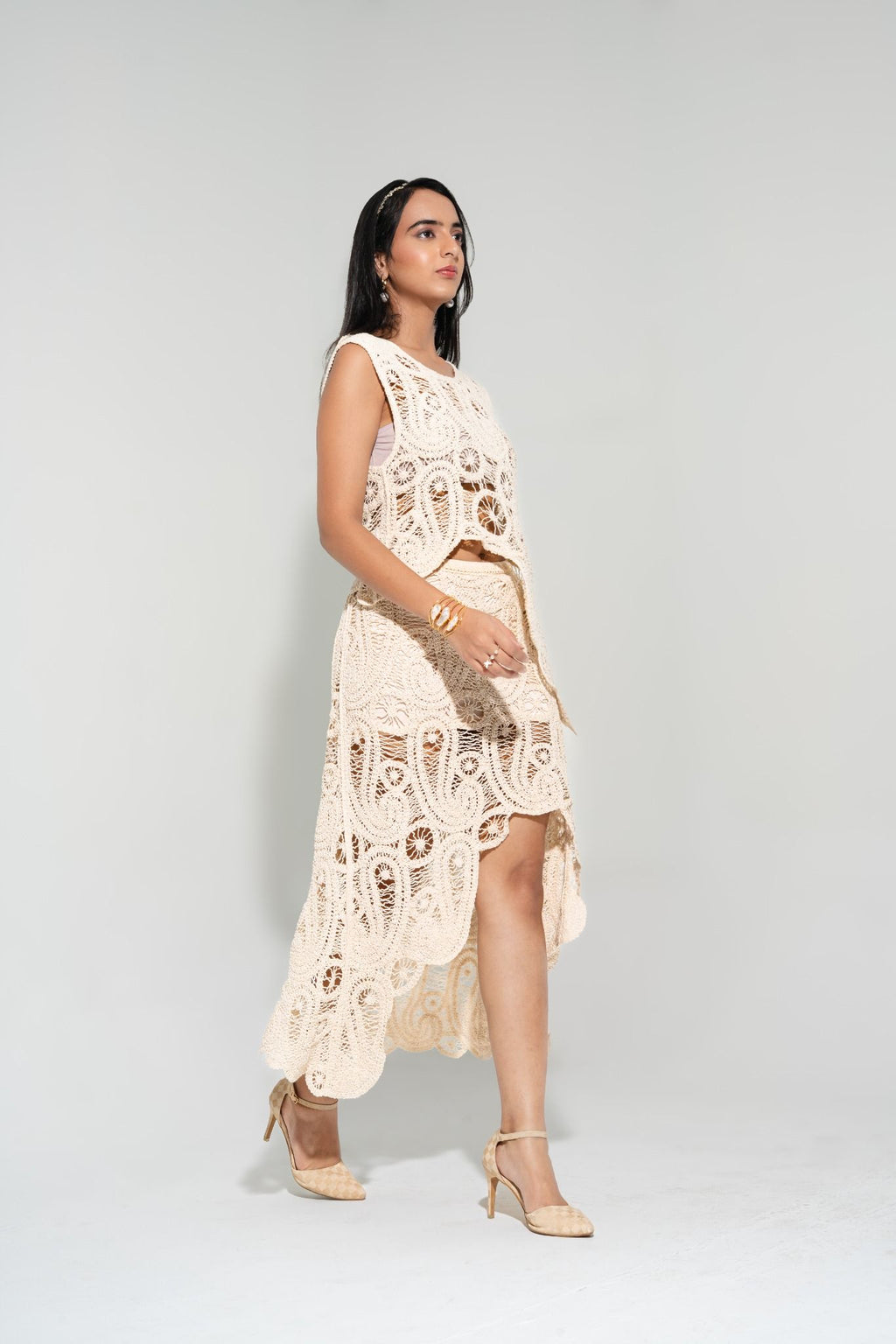 Side walking pose in Willow Crochet Coord Set, airy handcrafted crochet layers — perfect for beach and resort styling