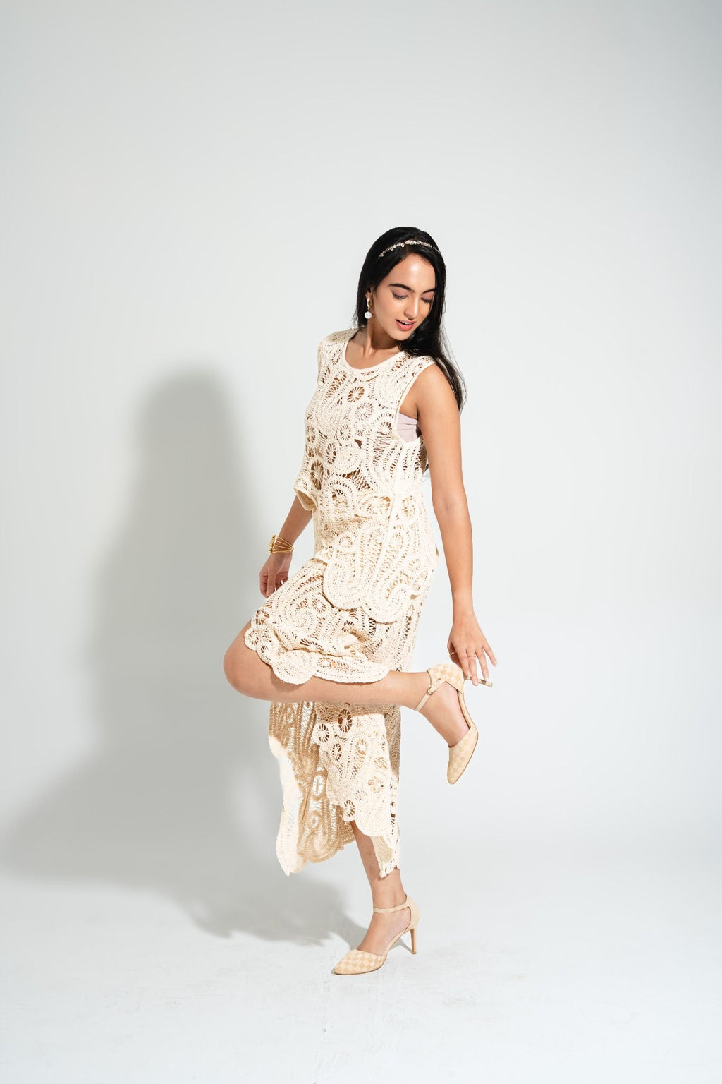 Playful movement pose in Willow Crochet Coord Set, showing flowy crochet fabric and premium craftsmanship — Boarding Pass.