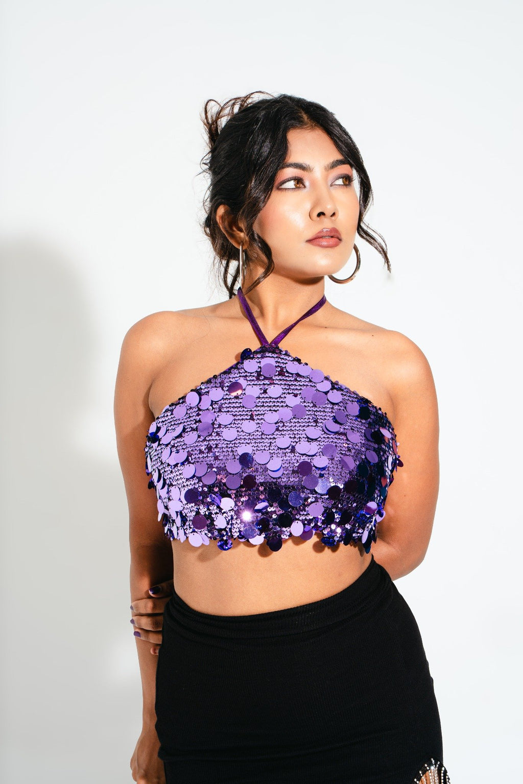 Vixen Purple Lulu Halter Sequin Top on model – bold shimmer look, perfect for nights out and holiday styling
